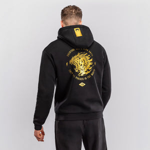 Sweatshirt Venum x Mike Tyson Tiger mit Kapuze Schwarz-Gold-Combat Arena