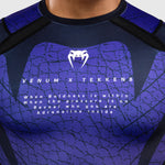 Rashguard Venum Tekken 8 Kazuya langärmlig Schwarz-Lila 