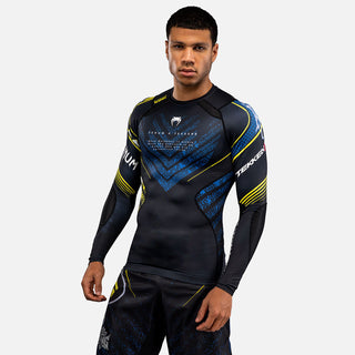 Rashguard Venum Tekken 8 King langärmlig Schwarz-Gelb 
